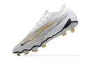 Chuteira Nike Phantom GX Low Elite FG Campo